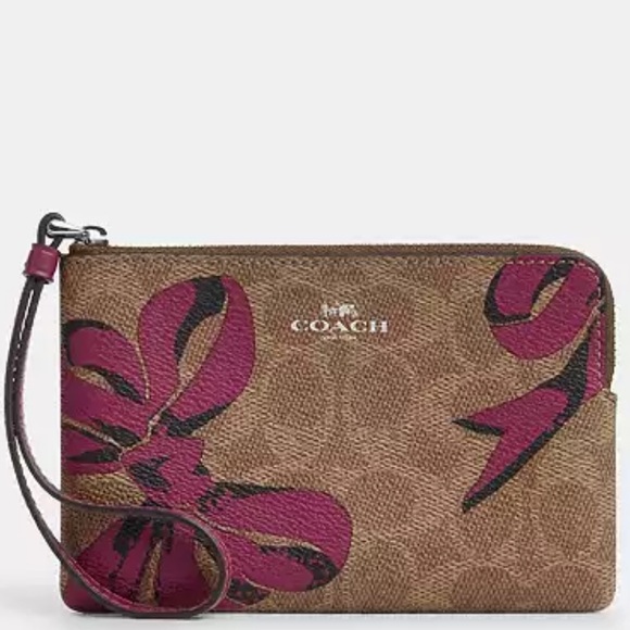 Coach Handbags - Coach Corner Zip Wristlet In Signature Canvas nwt in packaging